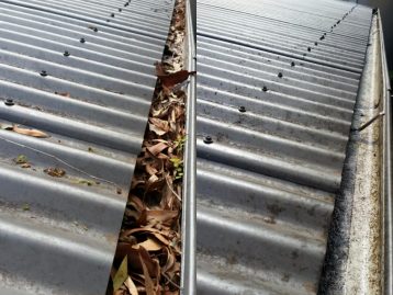 Image of a gutter after being cleaned on the Gold Coast